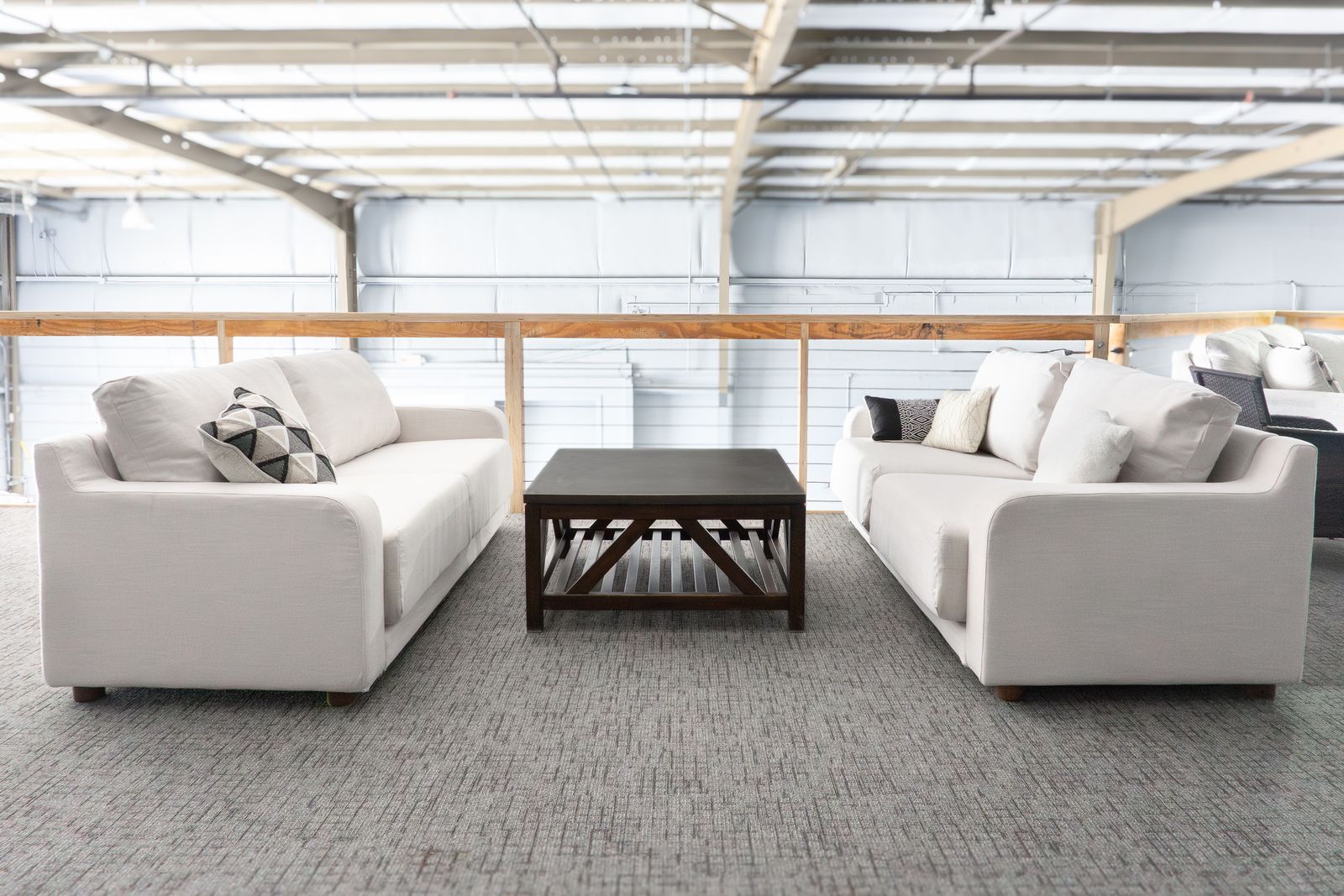 Facing sofas with a side shelf in the Loft